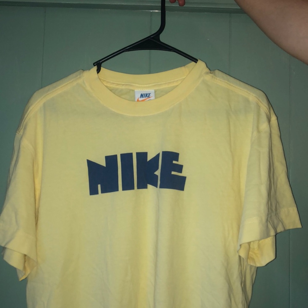 Yellow Nike tee